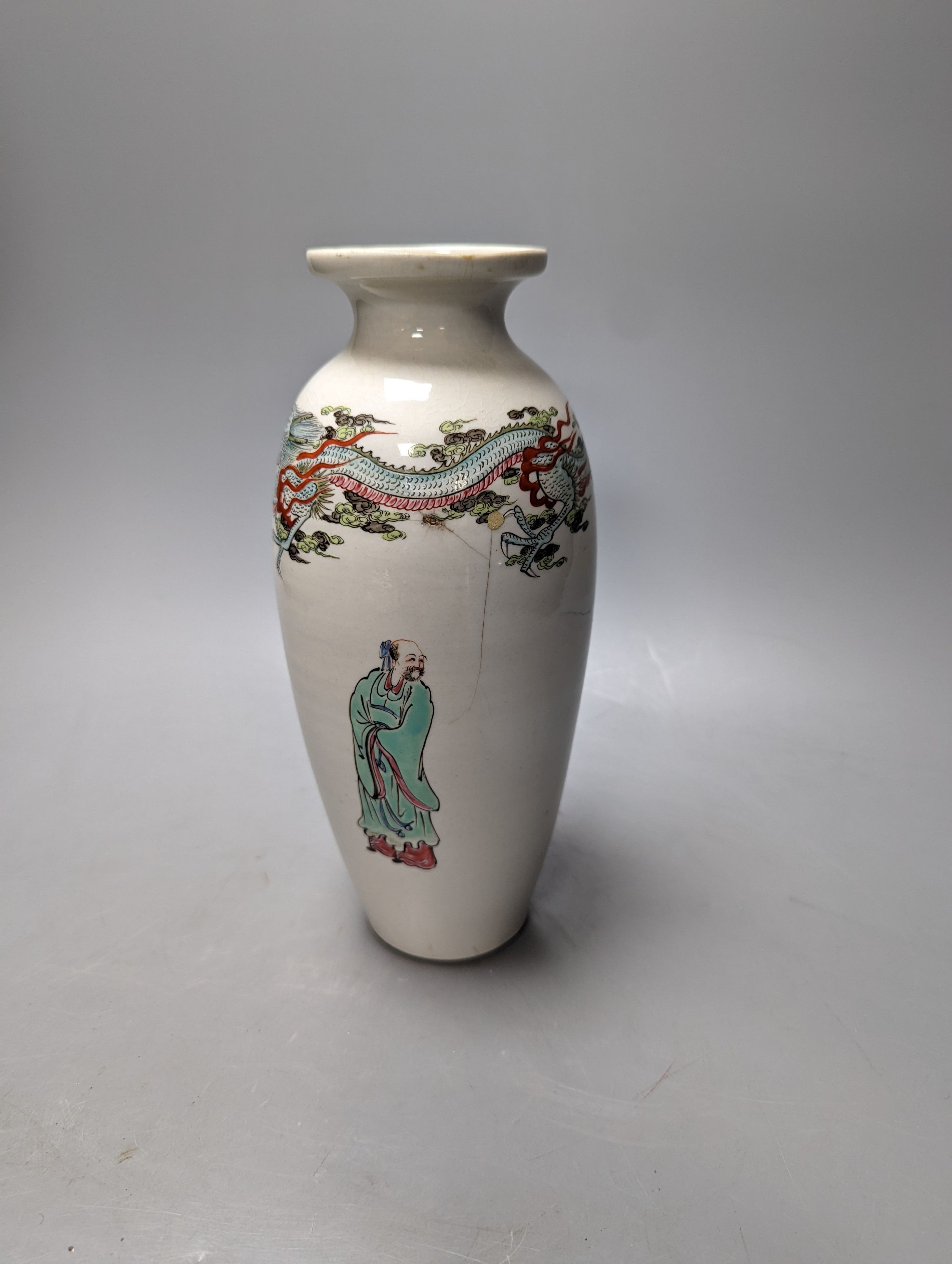An unusual Worcester polychrome enamelled vase, c.1755-60, of unusual shape, finely painted with a Chinese immortal summoning a dragon with two sages and a boy, 24cm high, cracked, rim faults